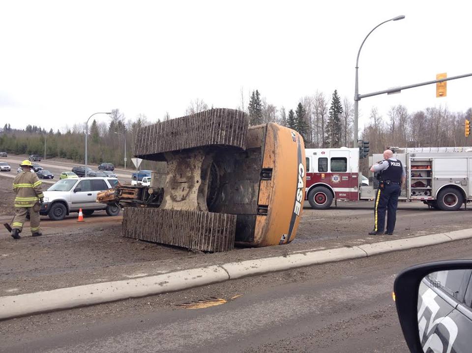 Excavator blocking traffic on Highway 16