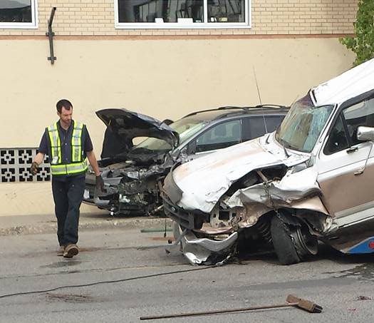 Truck hit 4 parked cars on Brunswick near Third