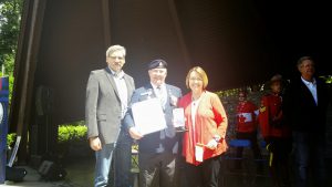 MLA Mike Morris, John Scott and MLA Shirley Bond after the medal presentation