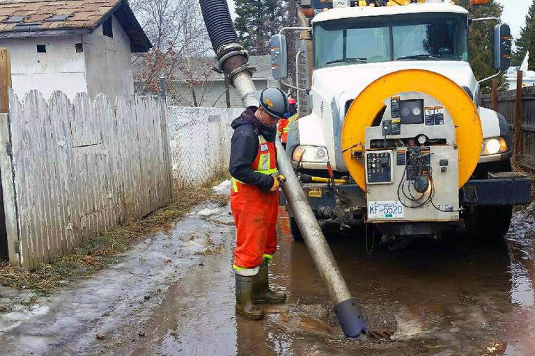 City workers battling flooding