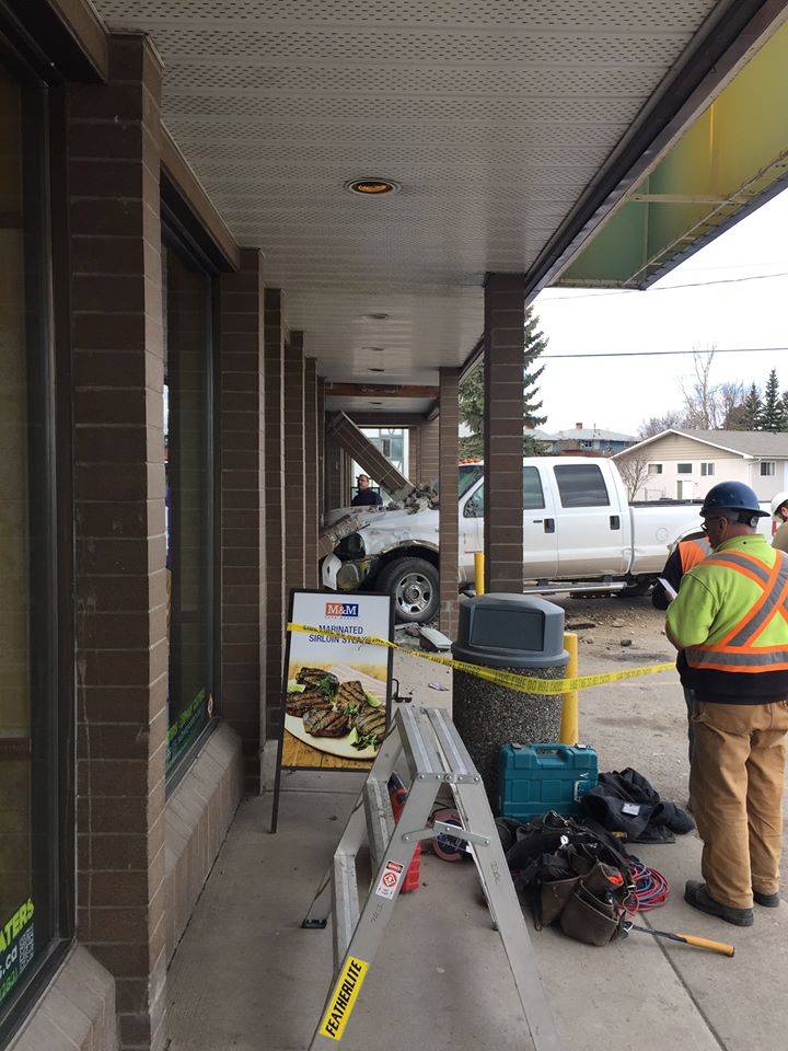 Truck crashes into 8th & Ahbau storefront