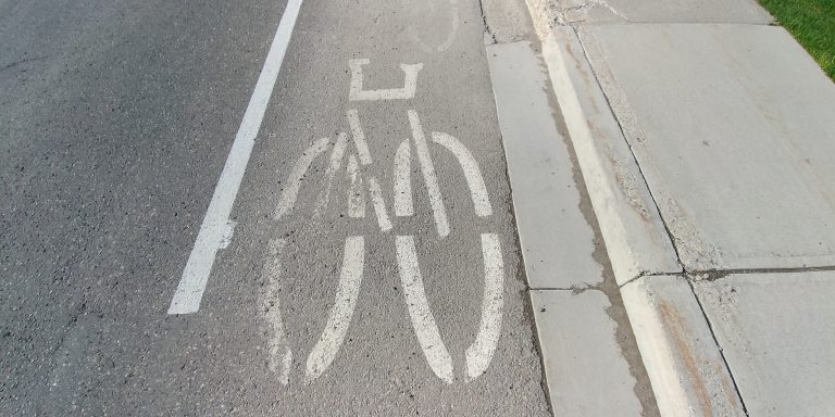 City to consider improved, protected bike lane network