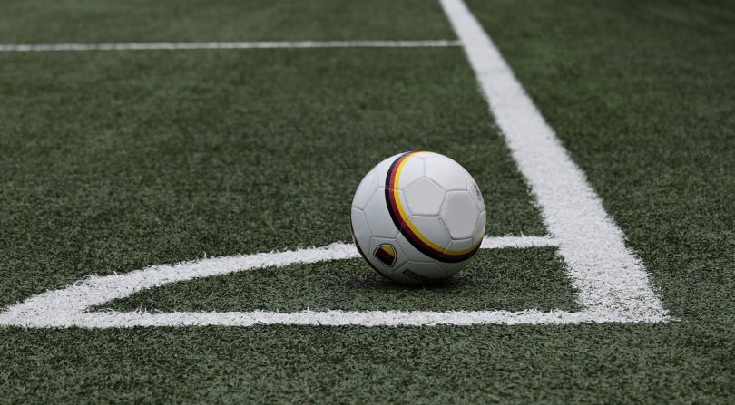 Stock image of a soccer ball in the corner of a field. | Pixabay