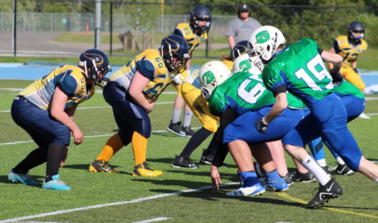 School District 57 gaining yards in football jamboree