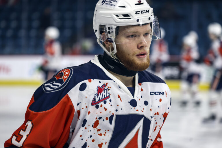 Cougars trade for import defenseman and sign draft pick