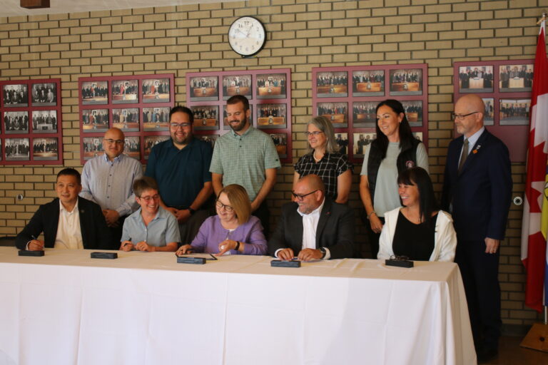 Local representatives come together to sign agreement on regional challenges