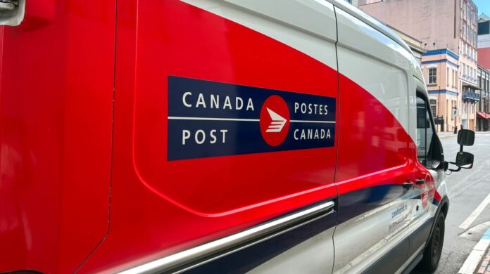 A Canada Post van parked on a street in Victoria, B.C. on May 20, 2025. | Emily Joveski, Vista Radio photo