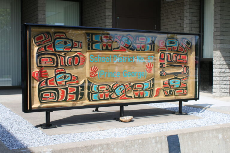 Refurbished welcoming carving unveiled for School District 57