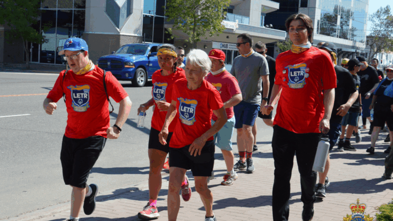 People running in the street.