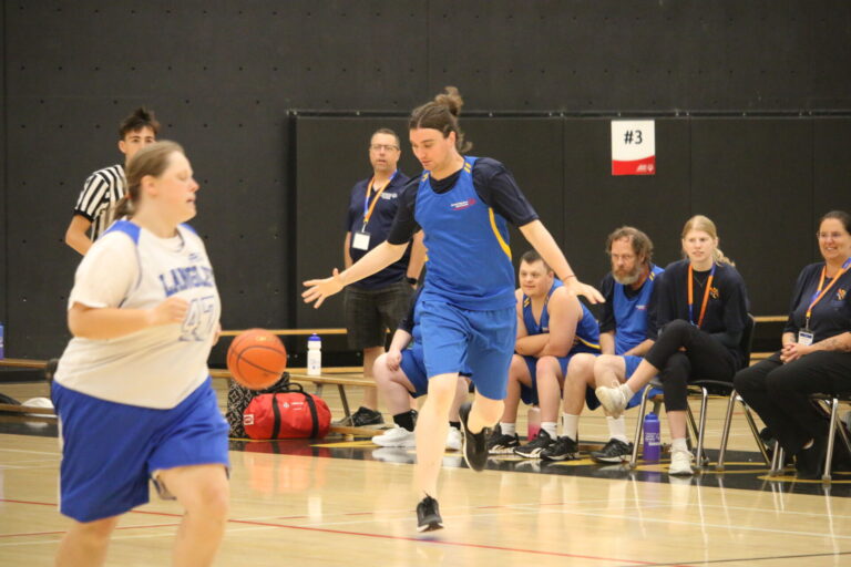 Chase Caron (wearing blue) is an athlete ambassador for the Special Olympics BC Games, and is competing in basketball for the first time (D. Bain, My PG Now staff)